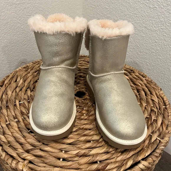 UGG Sparkly Gold Cream Mini Bailey Bow Boots Sherling - Picture 2 of 12